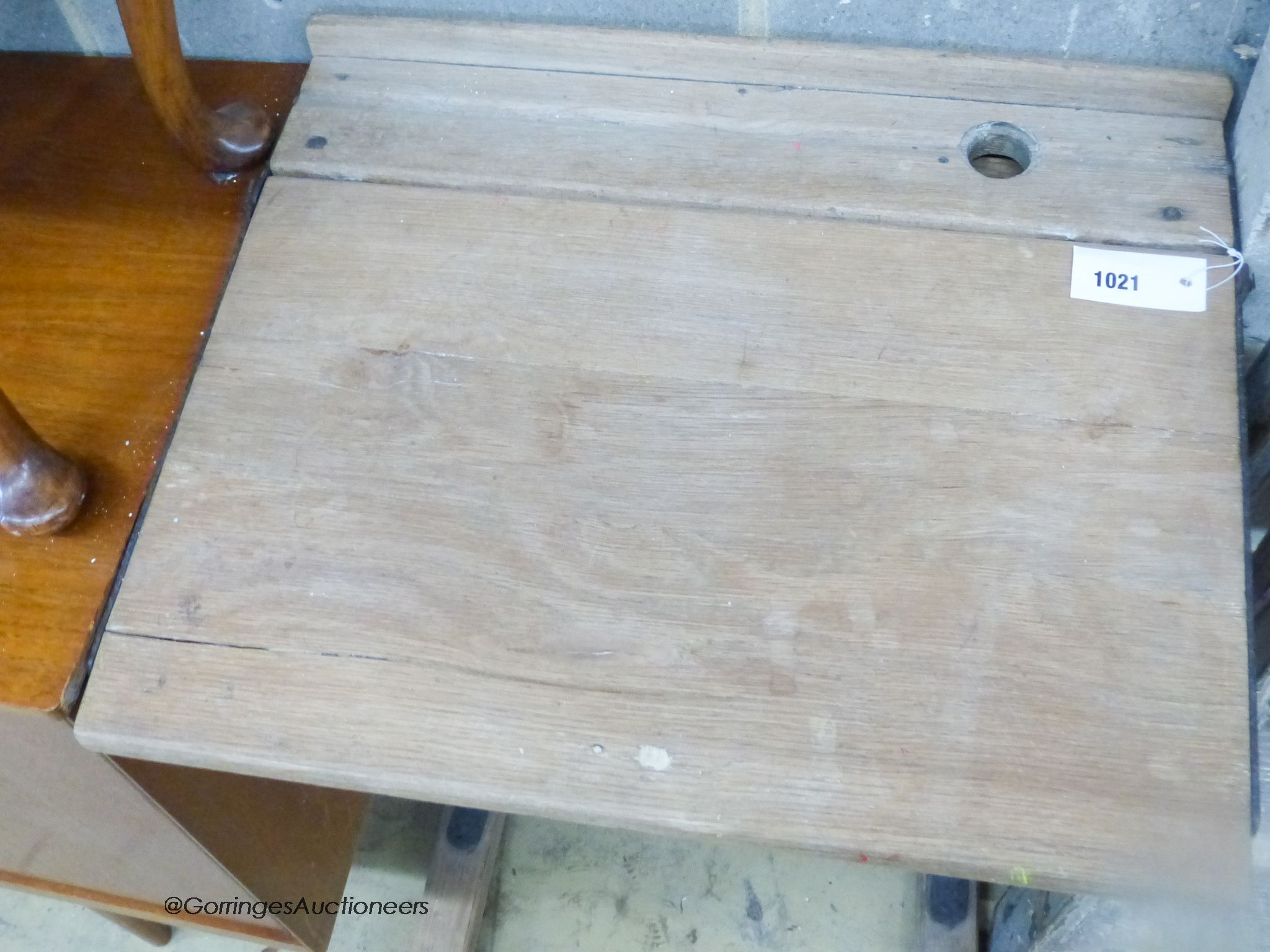 A vintage oak student's desk, width 56cm, depth 47cm, height 77cm